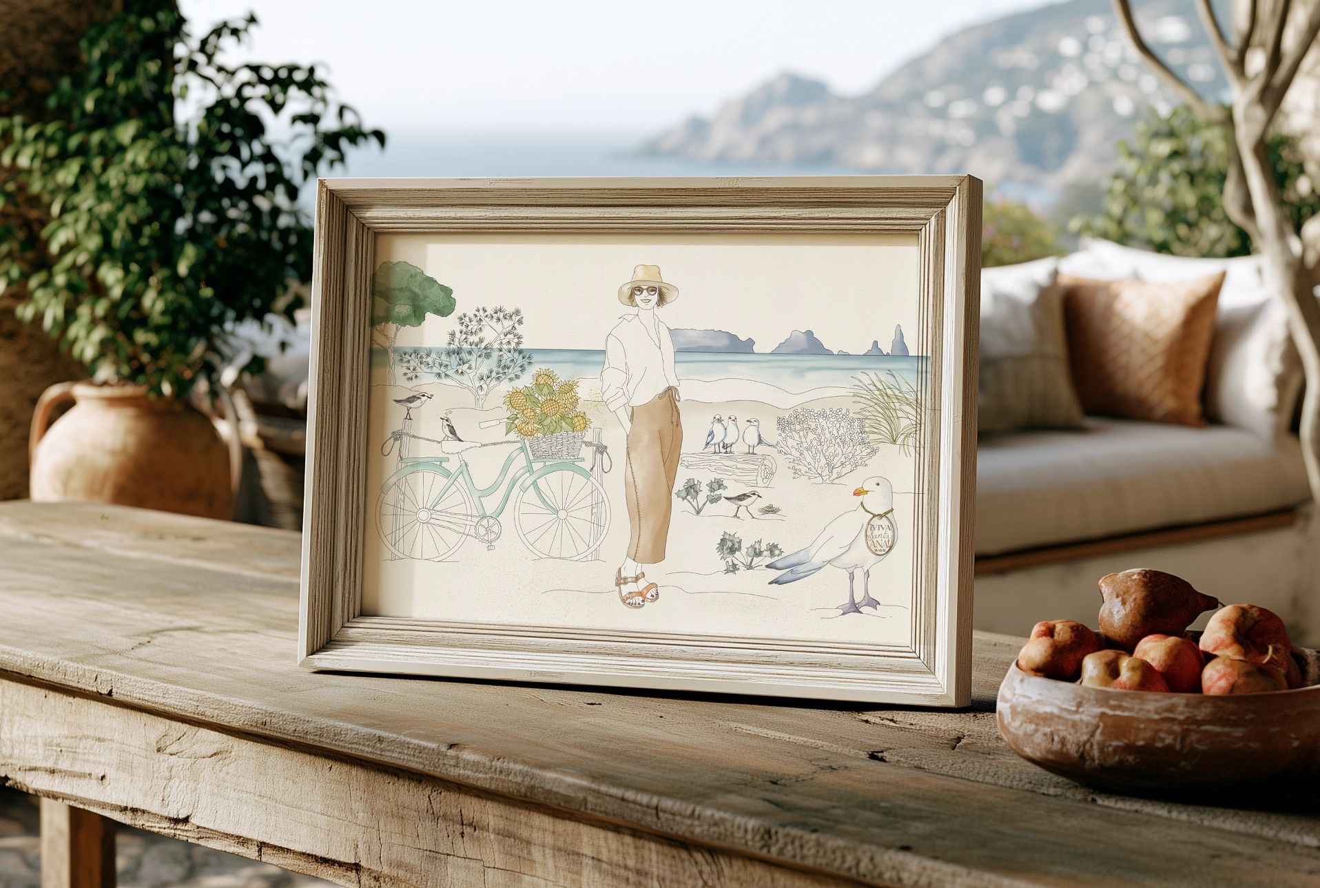 Framed custom portrait illustration of a woman at the beach with a bicycle loaded with sunflowers, gulls and small birds, custom portrait illustration by Lolita Cortés